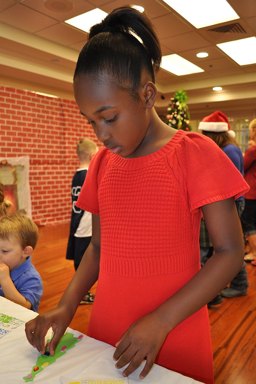 Canela Hundley came out with her parents, Elizabeth and Eddie, not pictured.
