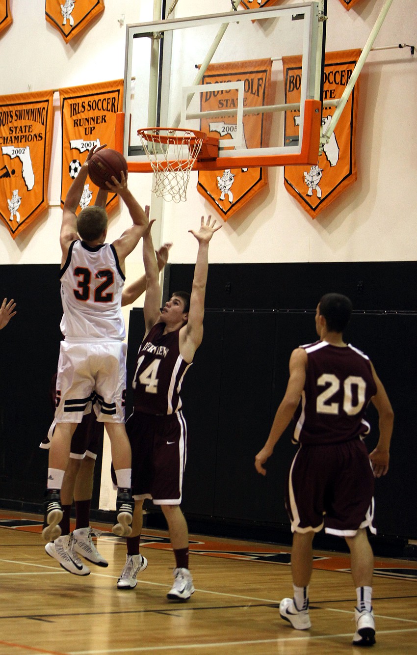 Sarasotaâ€™s Zack Rowden, No. 32, shoots the ball.