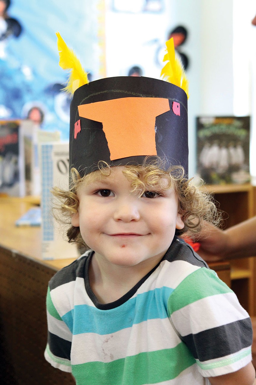Santiago Orbegoso, 3, wore a macaroni penguin hat that he made at Forty Carrotsâ€™ Penguins Aplenty, Penguins Galore camp.