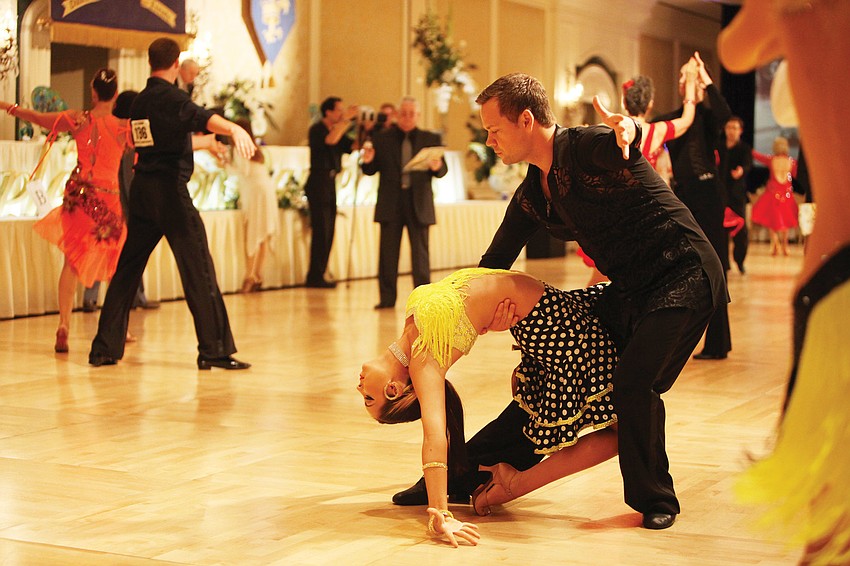 Sydney Johnson and Sid Pocius, of Empire Ballroom Dance Studios Sarasota, perform together in the 40th anniversary of the Florida State Dancesport Championships at the Ritz-Carlton, Sarasota.