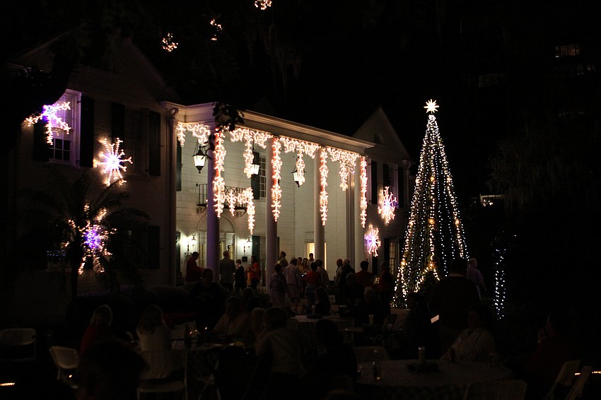 Many people visited The Payne Mansion and the bromeliad tree while taking part in the opening night of Lights in Bloom Saturday, Dec. 15, at Marie Selby Botanical Gardens.