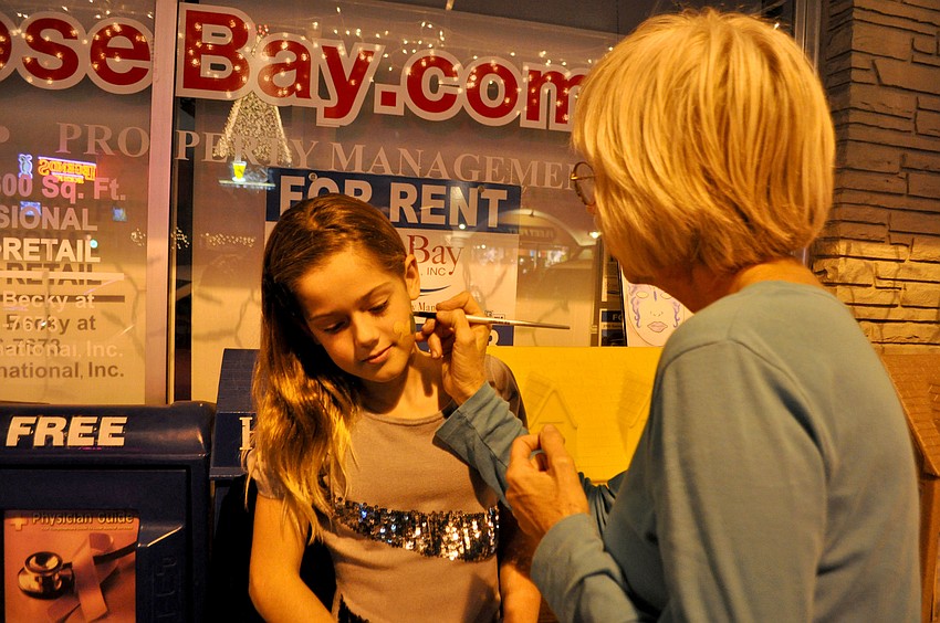 Courtney Seguin gets a face painting