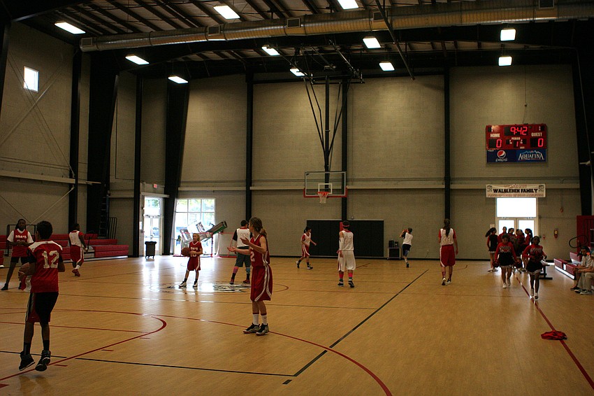 Students warmed up for a basketball scrimmage inside the new gymnasium at Sarasota School of Arts and Sciences.