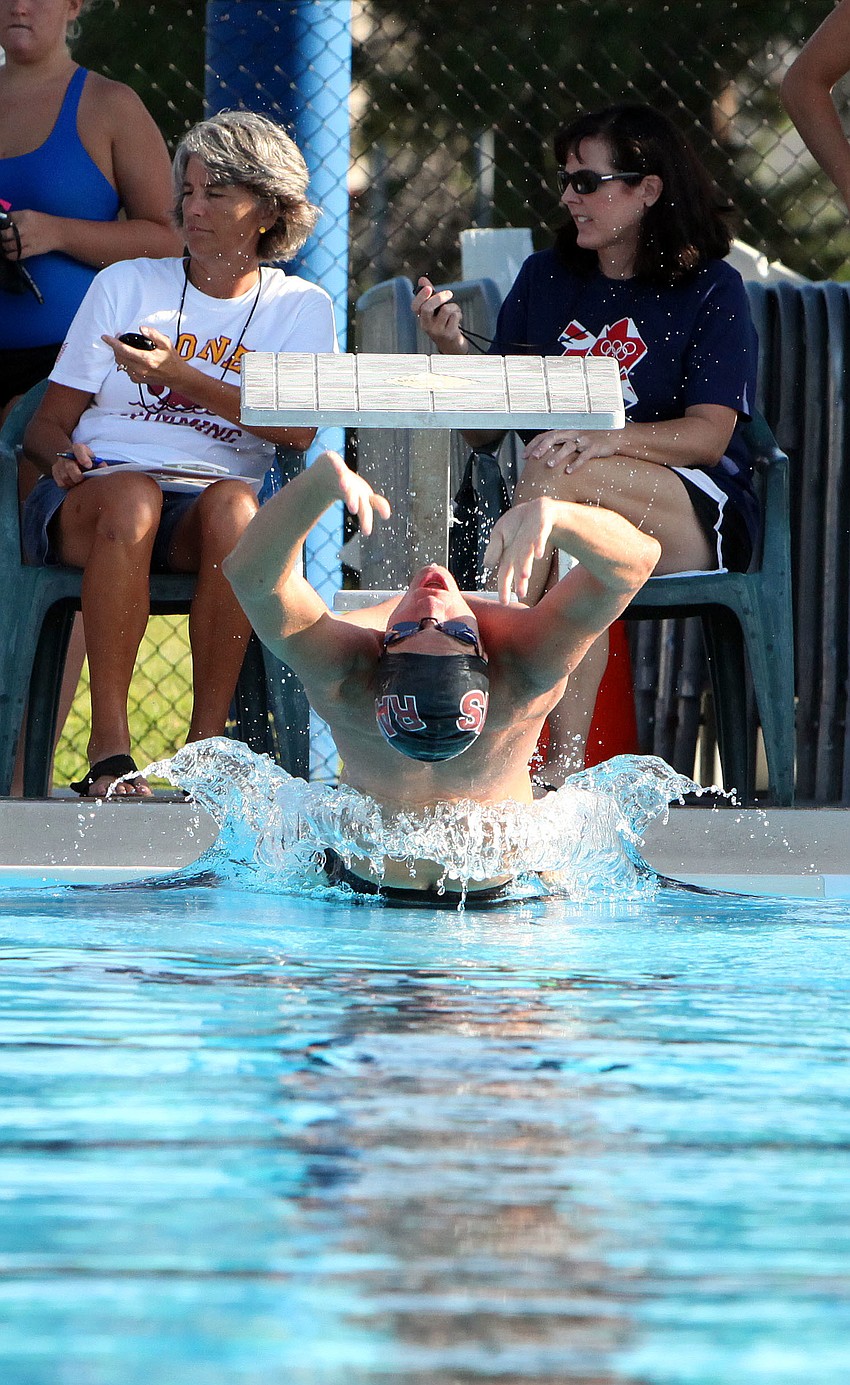 Liam McKane, 11th grade at Riverview High School, begins his event Wednesday, Sept. 12 during a swim meet at the Sarasota YMCA at Potter Park.
