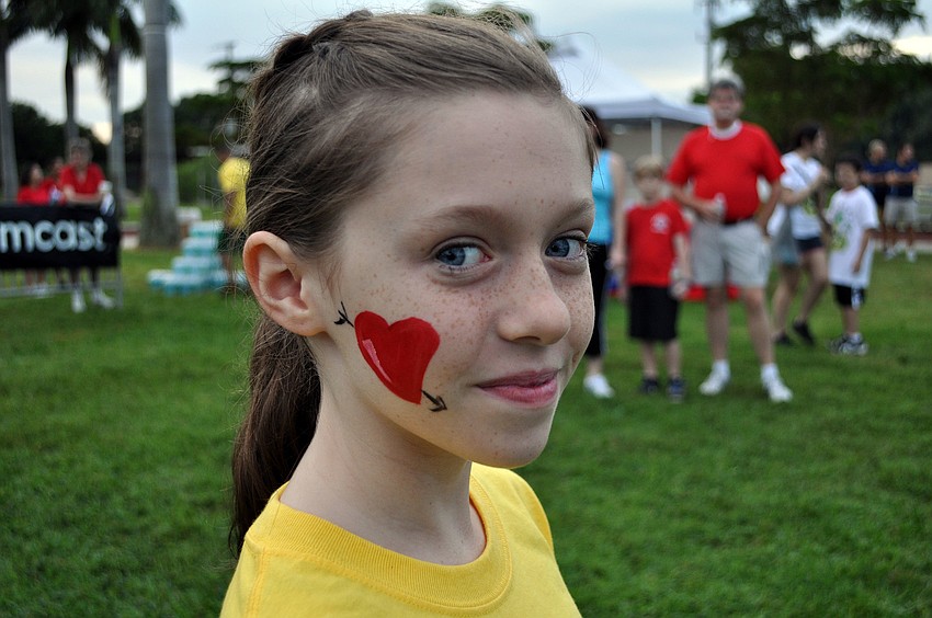 Casie Helriggle, 11, had a heart painted on her face at the Heart Walk Saturday, Sept. 22 at Payne Park.