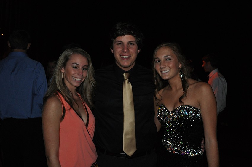Madison Shaw, Nicolai Israileff and Peyton Vaughn had fun at the dance Oct. 20.