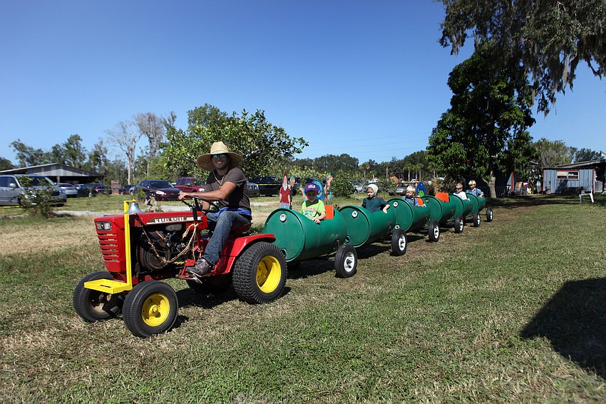 Children had the chance to take a mini-train ride around a small course set up at Fruitville Grove Saturday, Oct. 20, during the Fruitville Grove Pumpkin Festival.