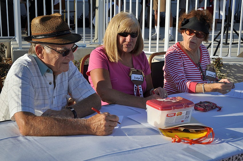 Dick Berk, Suzanne Shuster and Charlene Wray were the judges Monday, Oct. 22, for the 2nd annual Halloween Doggie Parade at Stoneybrook Golf and Country Club in Palmer Ranch.