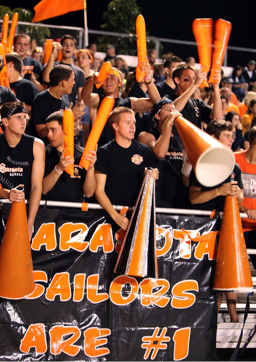 Sarasota High students cheer from the stands at Ihrig Field Friday, Oct. 26, during the Riverview High School versus Sarasota High School football game.