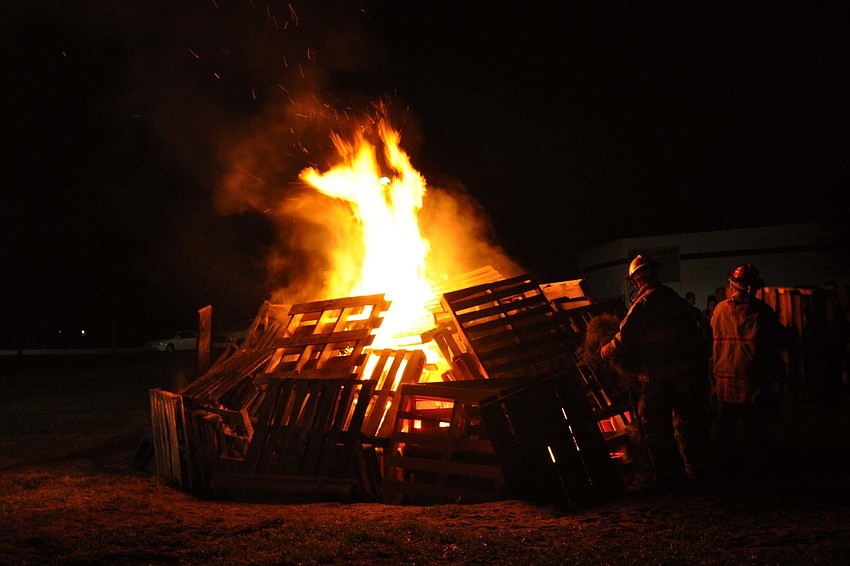 Firefighters from East Manatee Fire Rescue lit the bonfire Oct. 25.