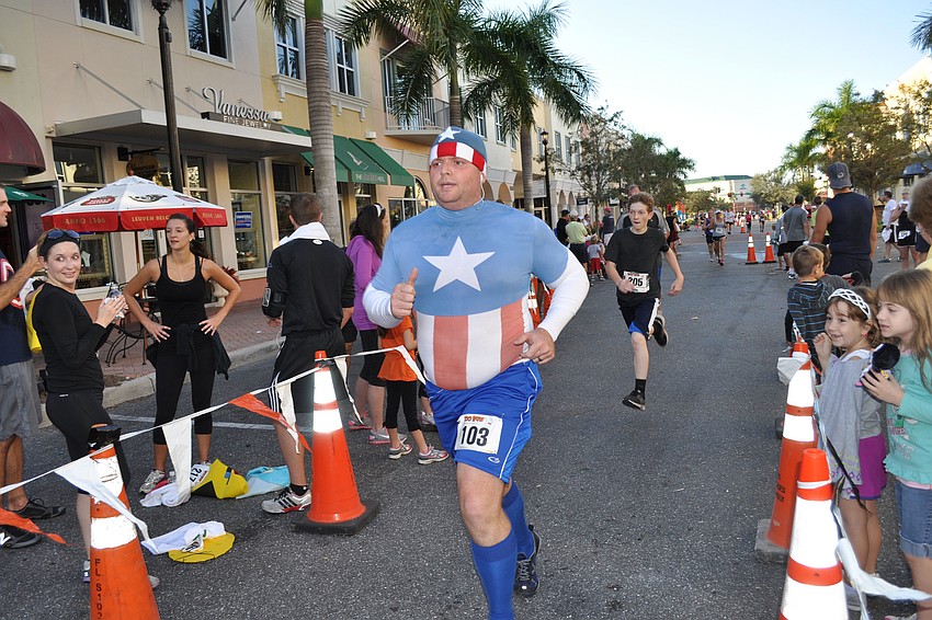 Tony Fitzgerald, a Lakewood Ranch fire lietuenent, ran to benefit Grayson Tullio, a boy who suffers from Duchenne Muscular Dystrophy.