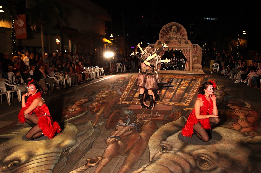 Mary Richardson, Caitlin McMullen, Wendy Rucci and Molly Nichols performed on Kurt Wennerâ€™s chalk piece Monday, Nov. 5.