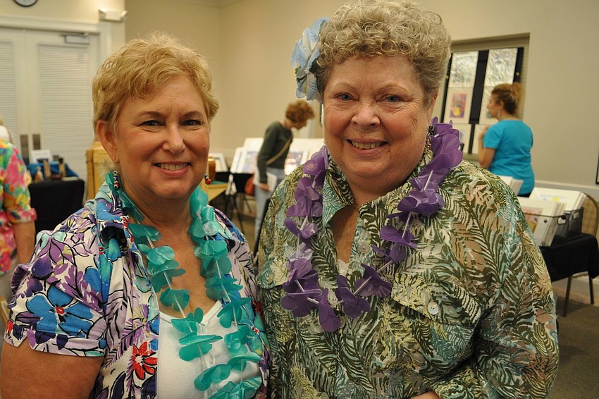 Sharon Kenney and Susan Perry both make jewelry.