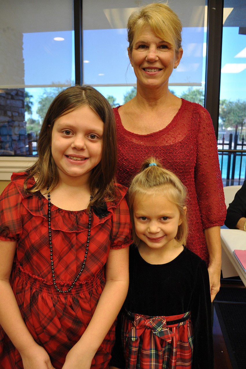 Lisa Badolato came out with her boyfriend's grandchildren, Jacie and Kendall Dyer.