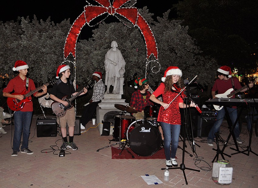 The Junior All Star Band performed songs on St. Armands Circle Friday, Dec. 7, at the Holiday Night of Lights.
