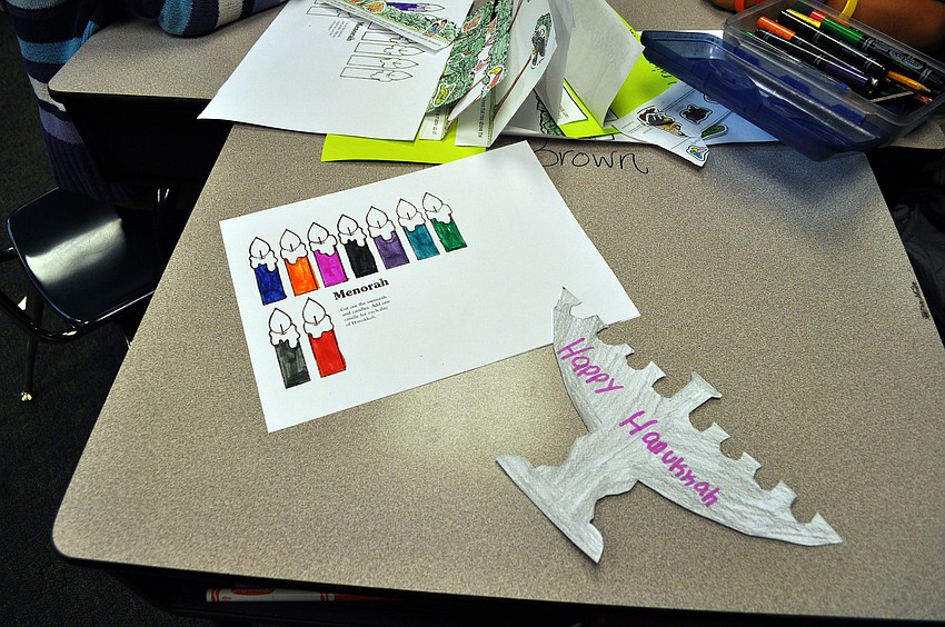 Students worked on making their own menorahs using paper, markers and crayons.