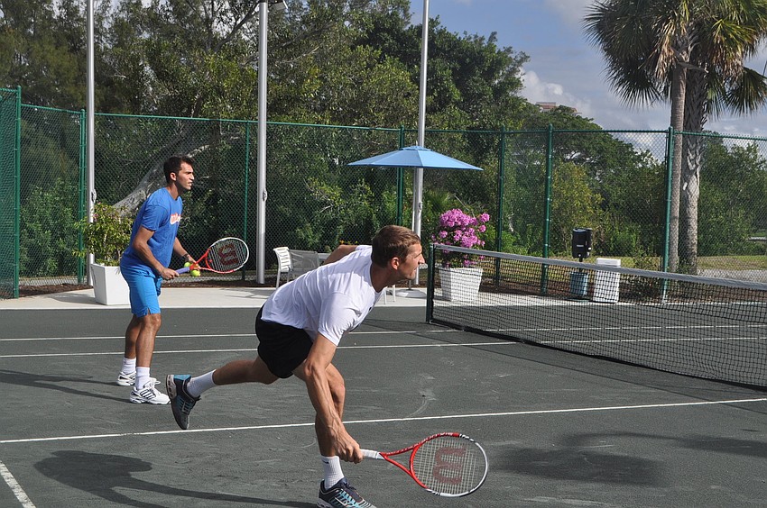 Horia Tecau and Max Mirnyi guard the net.