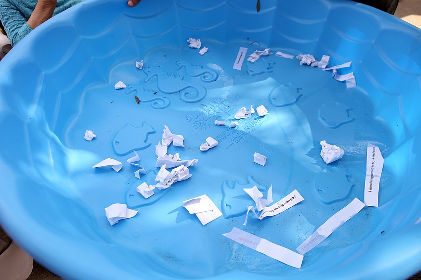 A kiddie pool was taken around for people to throw their crumpled up sins into Tuesday, Sept. 18.