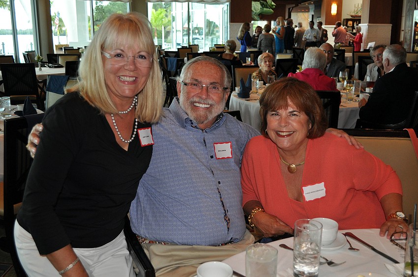 Judy and Bob Lemon pose at their table with Chris Herschberger Wednesday, Sept. 19 at Longboat Key Republican Clubâ€™s meeting at the Sarasota Yacht Club.