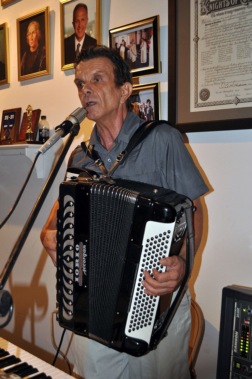 Bob Knight played keyboard and the accordion Saturday, Sept. 29 at the Knights of Columbus Annual Luau at St. Michael the Archangel.