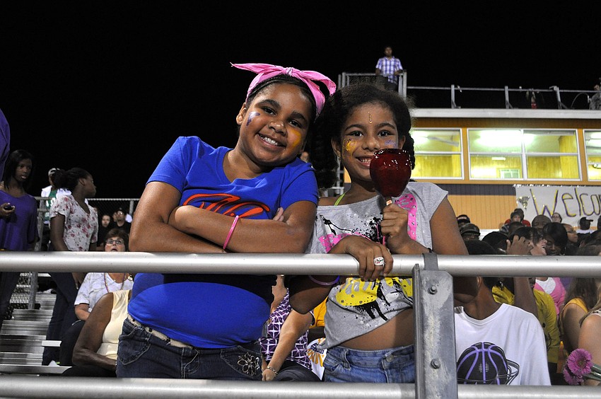 Zionna Williams and Olivia Benjamin relax during halftime.