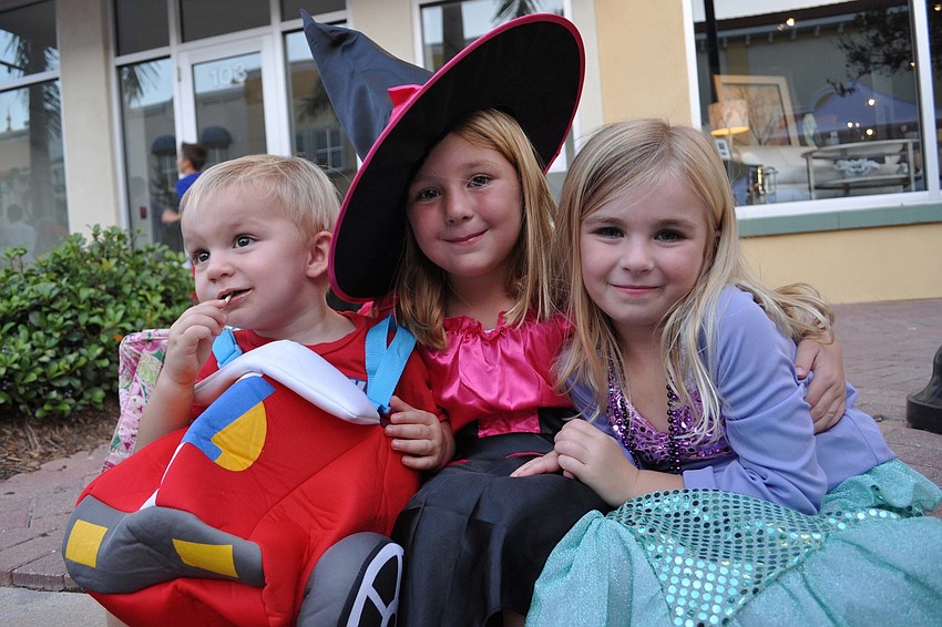 Luke, Emma and Mia Jordan took a short break for candy.