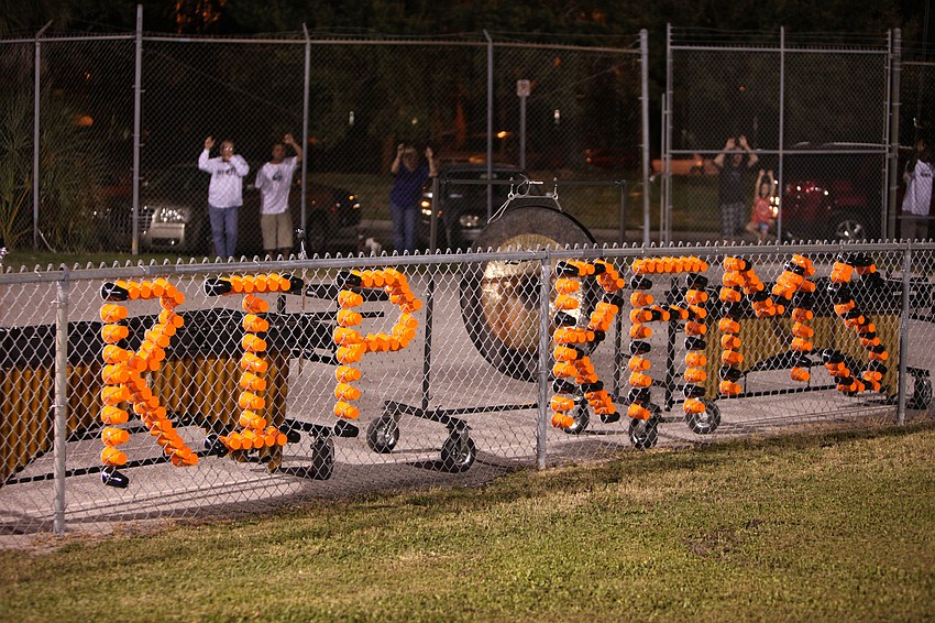 Orange and black cups spelled out â€œRIP RAMSâ€ in the fence surrounding the field Friday, Oct. 26, during the Riverview High School versus Sarasota High School football game.