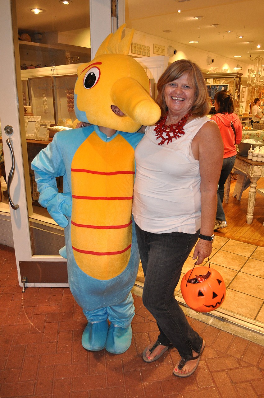 Jessica the Seahorse and Val Willard handed out candy outside of Fanta Sea Wednesday, Oct. 31, on St. Armands Circle.