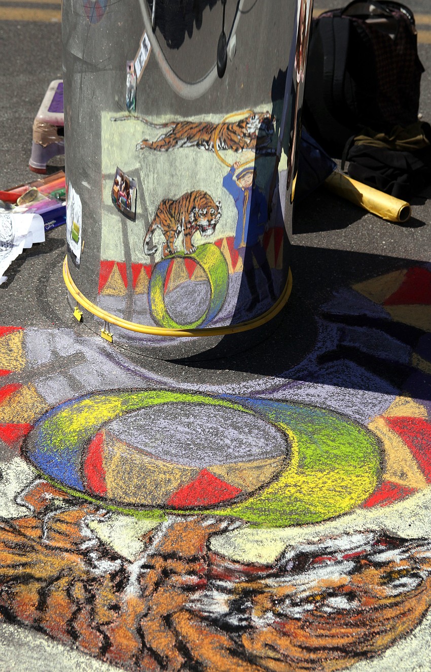 Kitty Dyble Thompsonâ€™s piece required the viewer to look at the piece in a cylindrical mirror.