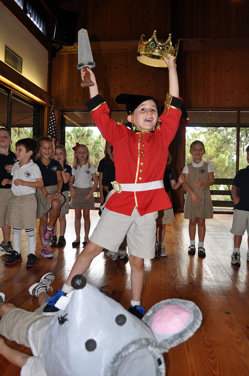 P.J. Svilokos, as the toy soldier, defeats the Mouse King, Aiden White, during the battle in the â€œMarch of the Toysâ€ song.