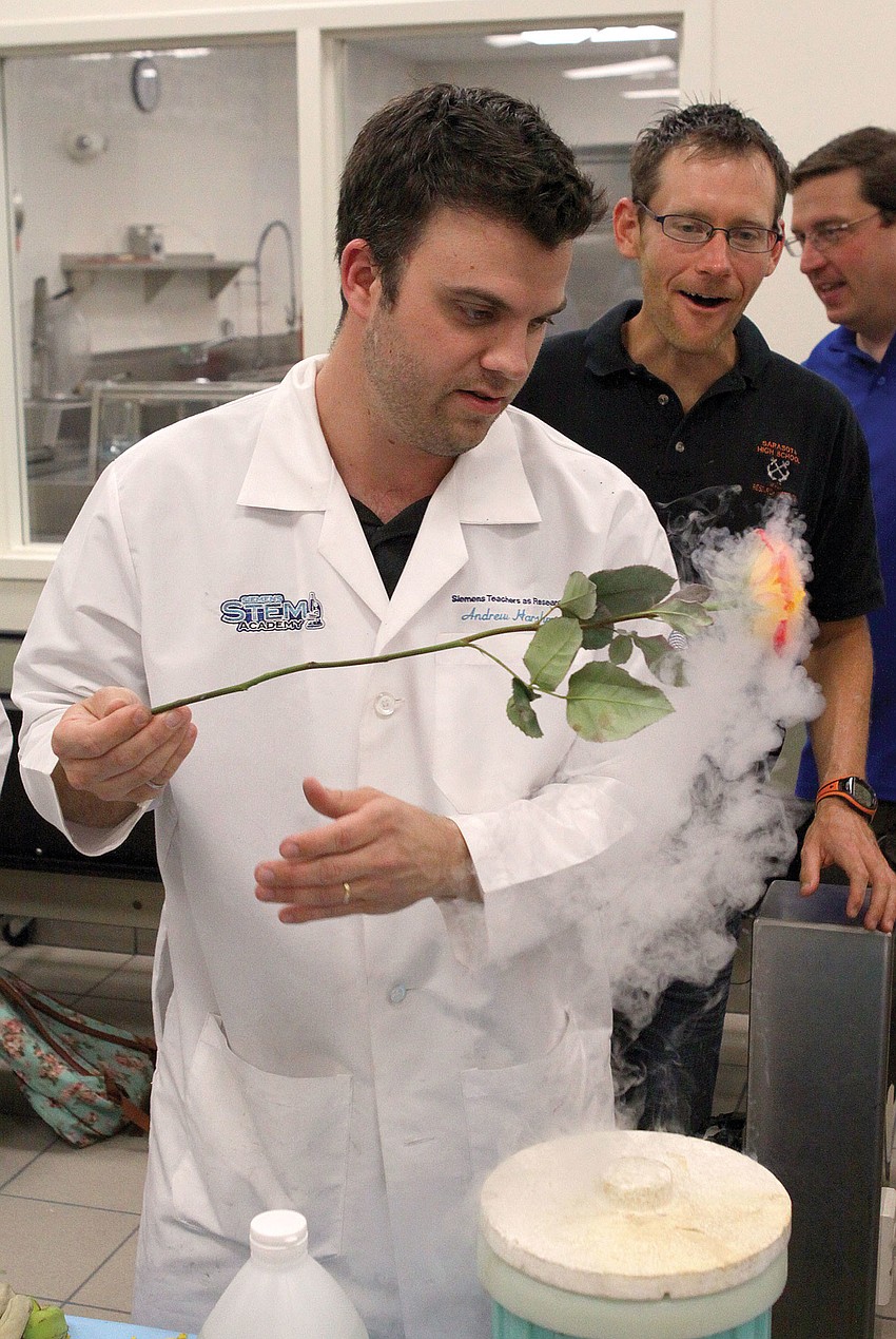 Andrew Harshman froze a rose with liquid nitrogen during Southside Elementary Schoolâ€™s fourth annual Science Night.