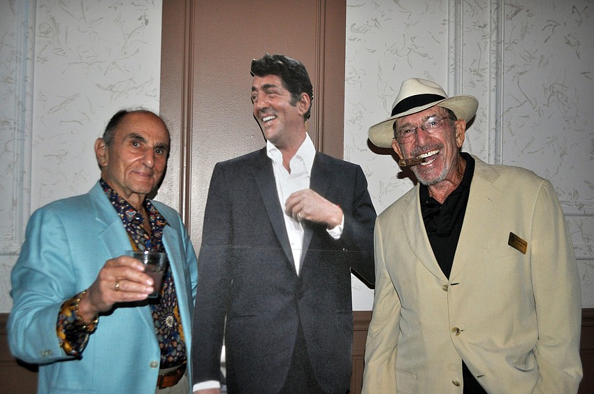 Sy Klionsky and Dr. David Solomon ham it up with Dino.