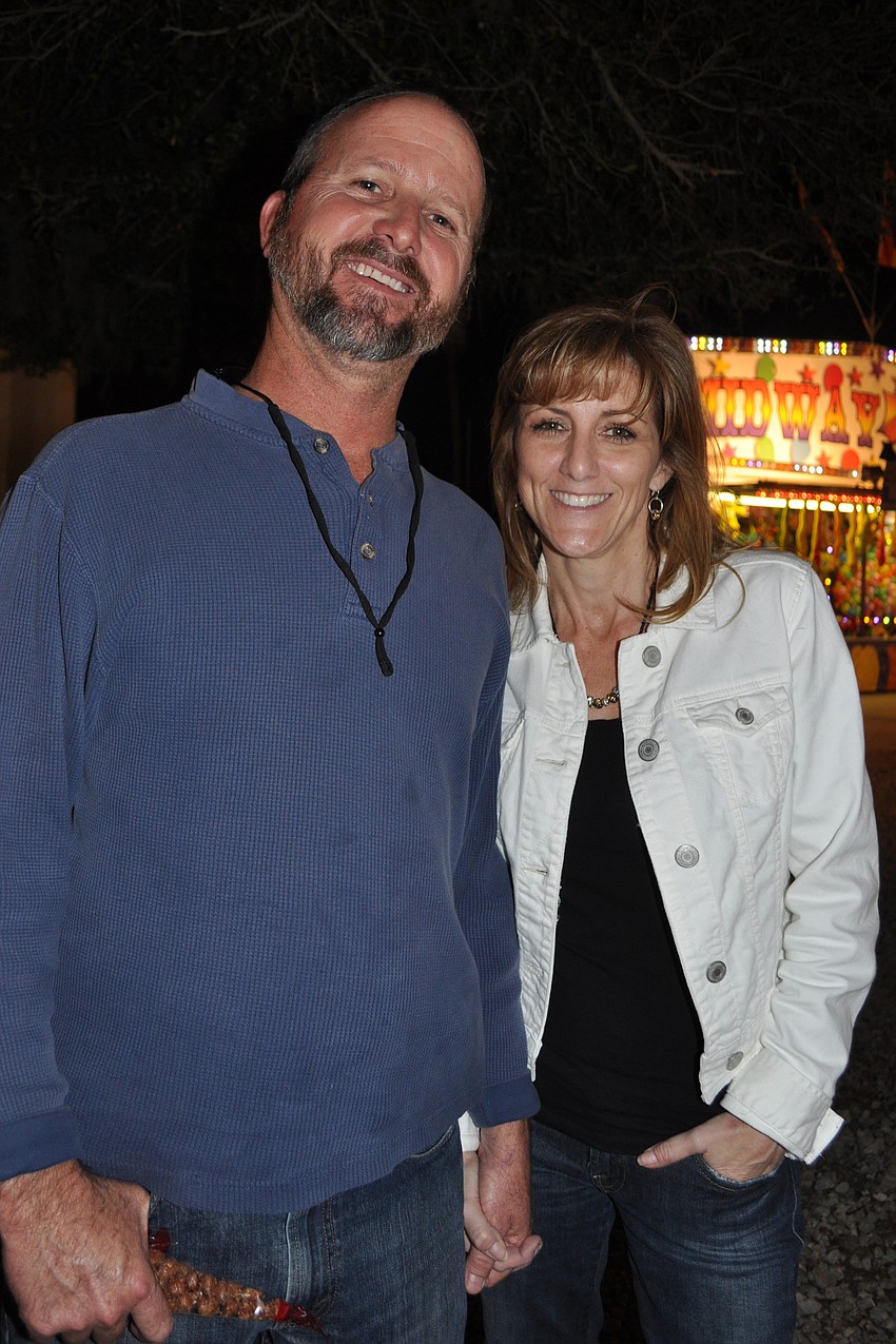 Lyle and Kristen Whidden reminisced as they saw a ride their children used to love.