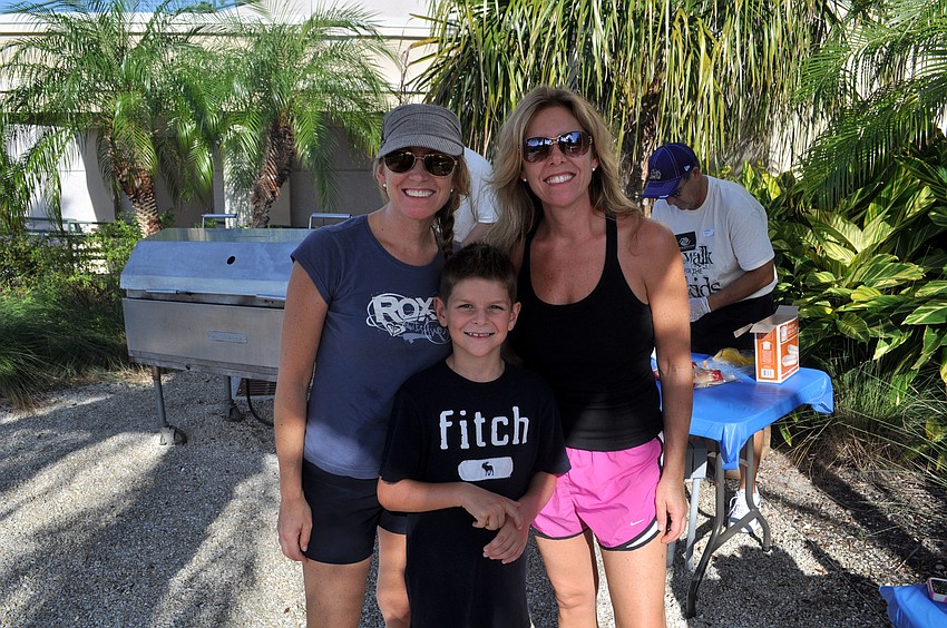 Sheryl Vieira with Jason Albano and Sandy Albano.