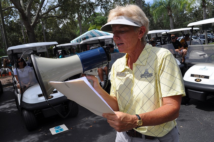 University Park Country Club's Sue Ertl gave golfers their instructions immediately before the 1 p.m. shotgun start.