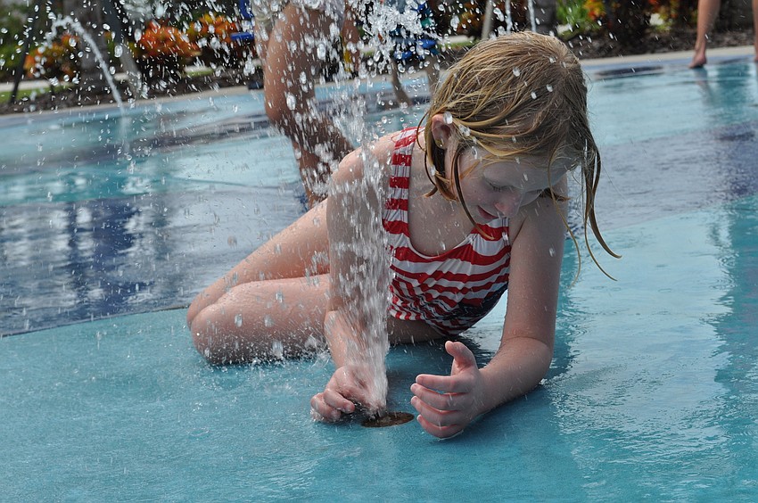 Brianna Neal, 8, had fun at the splash park.