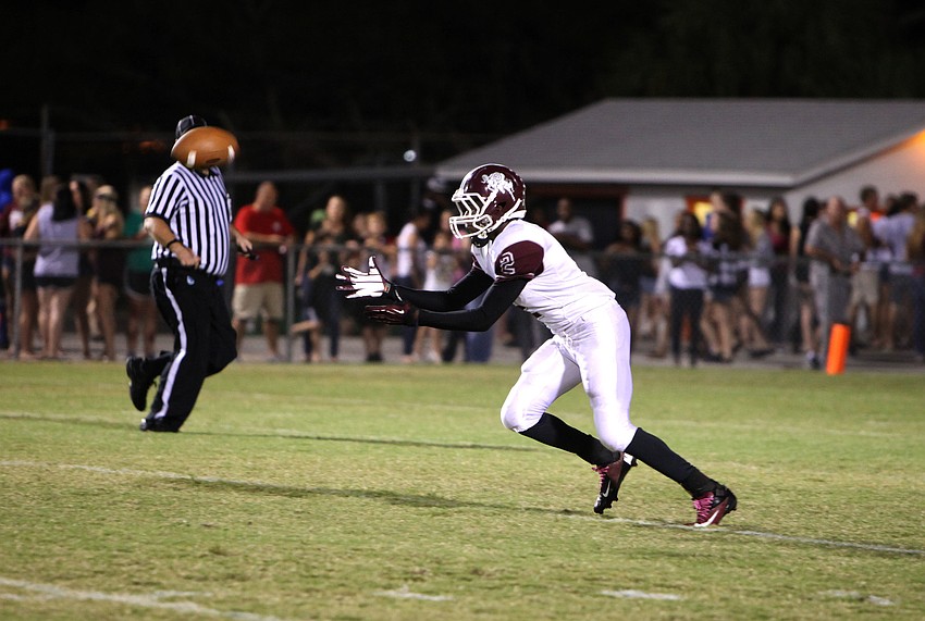 Richie James, No. 2, goes for the ball.
