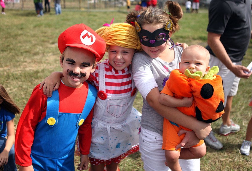 Levi Sparks, 6, Noaha Sparks, 6, Lydia Hollenstein, 9, and Henry Hollenstein, 6 mos.