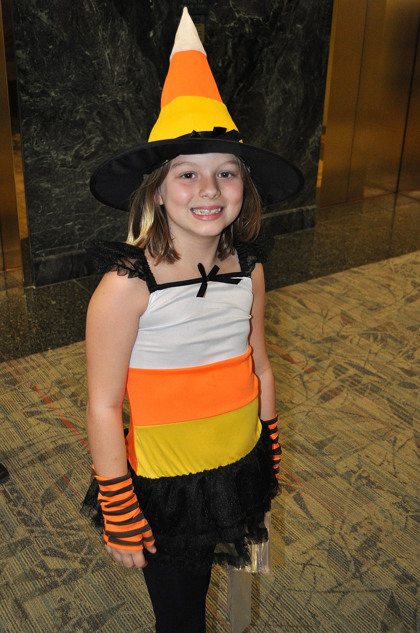 Hayleah Ritter, 8, dressed up as a piece of candy corn.