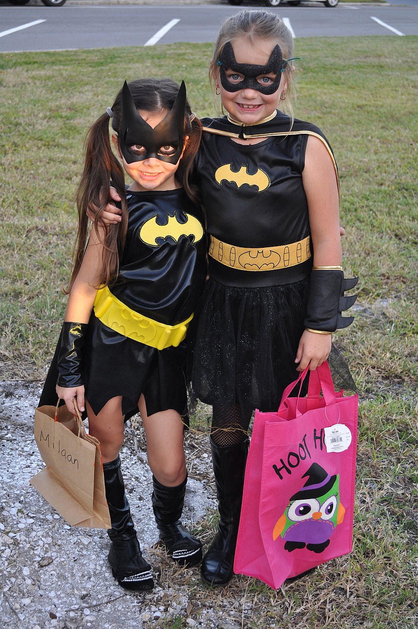 Milaan Smith, 5, and Lilly Nace, 7, dressed up at Bat Girls