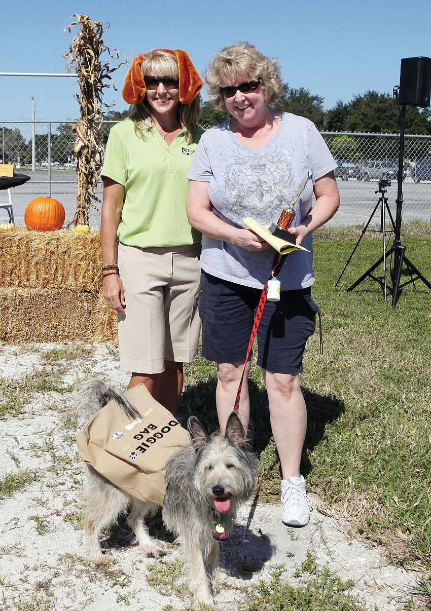 Executive Director of HSSC Kristie Dorman with Lisa Meneses and the winner of the most creative costume award, Lucy.