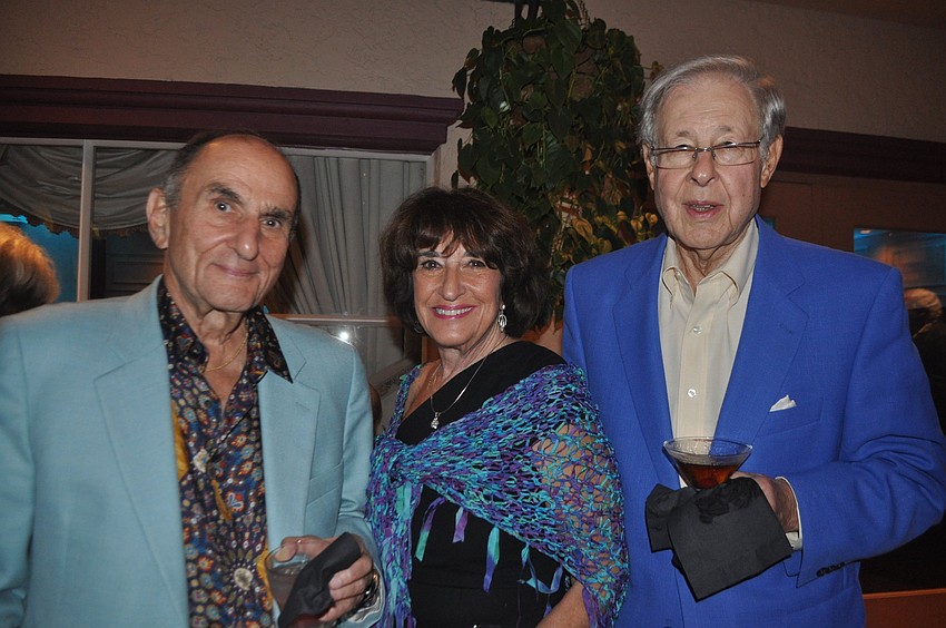 Sy Klionsky, temple president, with Evelyn Maurer and Donald Kayton
