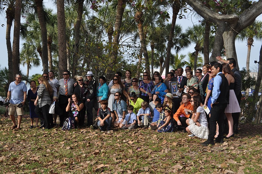 More than 50 members of the Rodriguezâ€™ extended family gather for a photo.