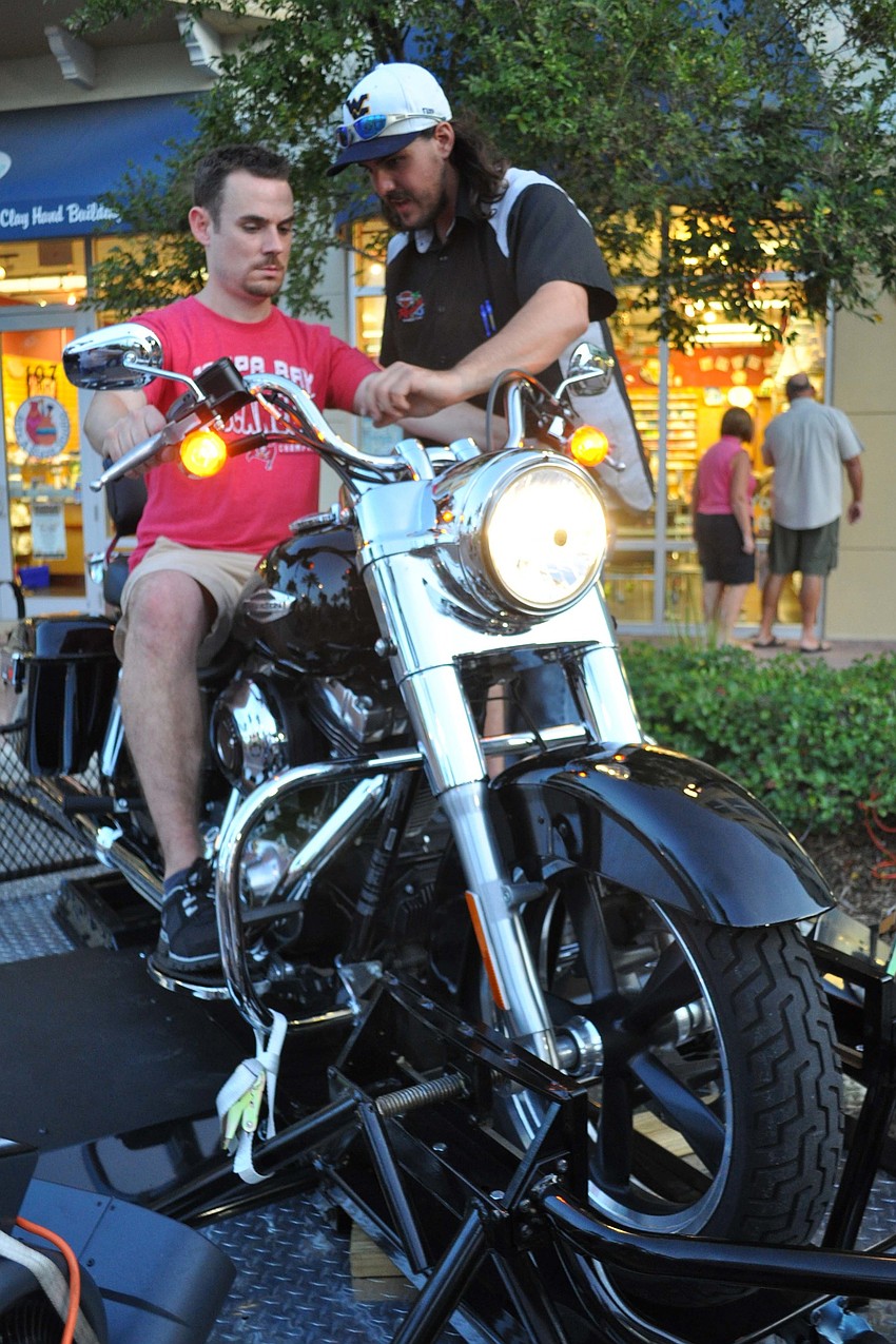 Shawn Caffrey tried Manatee River Harley-Davidson's Jump Start Rider Experience, with the help of Harley mechanic Bobby Murphy.
