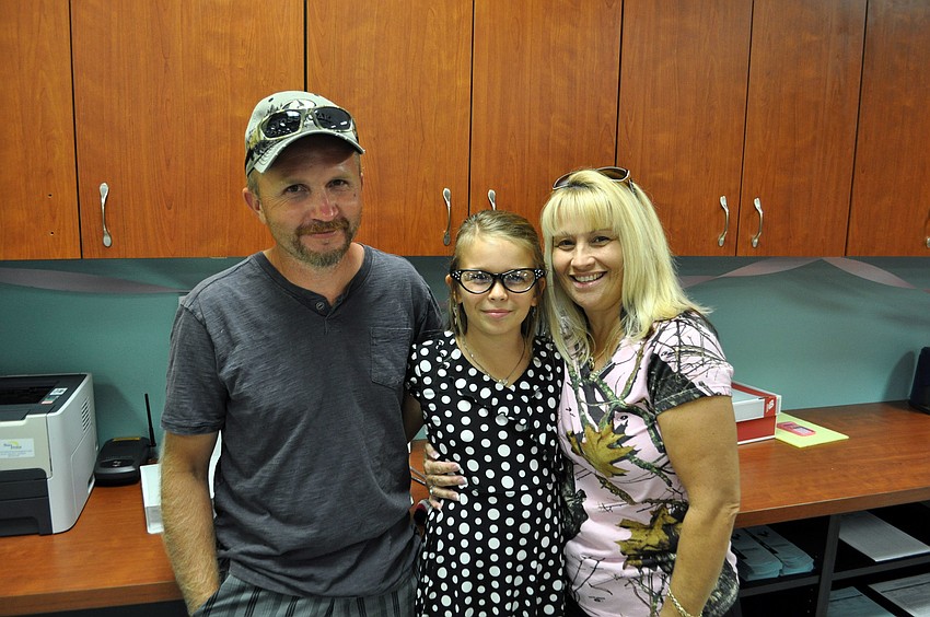 Ken and Diana Yoder with their daughter, Savannah