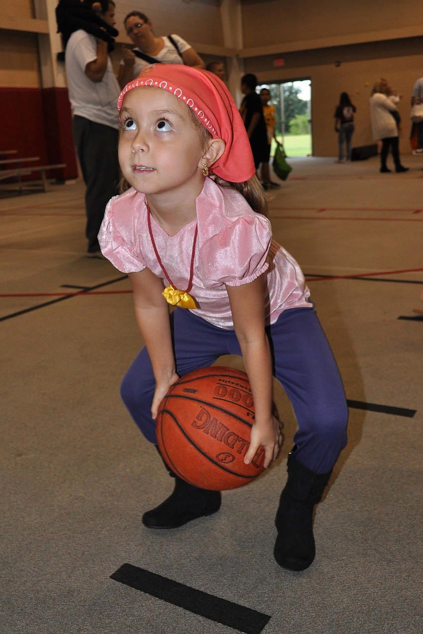 Alyssa Little, 4, tried her best to make a basket.