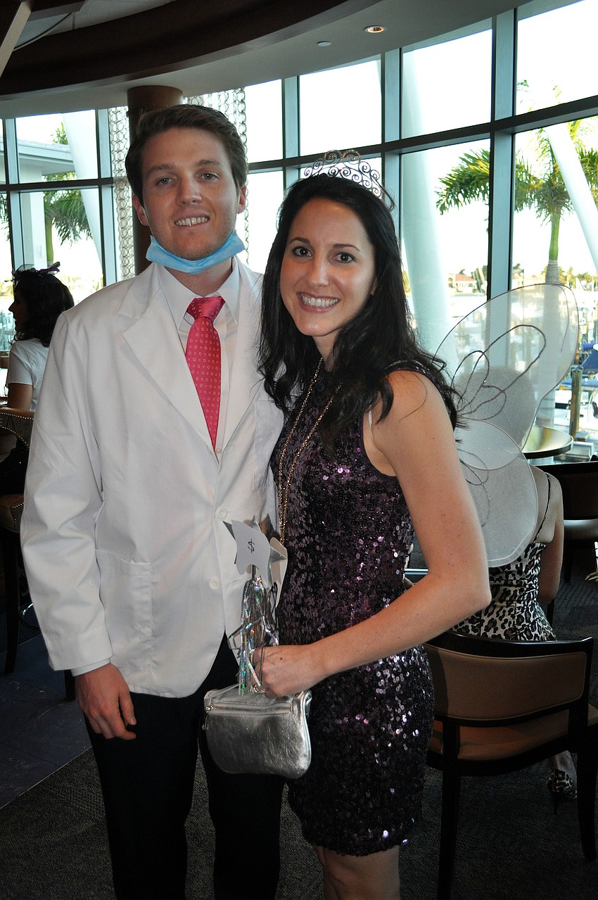 Gray Lawry and Natalie Lewis as a dentist and the Tooth Fairy.