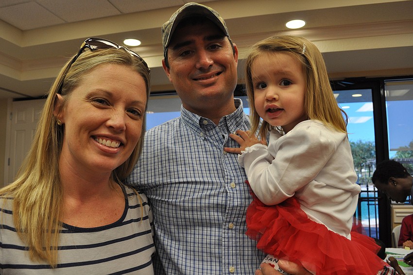Vanessa, Phil and Anna Heuss were eager to meet Santa.