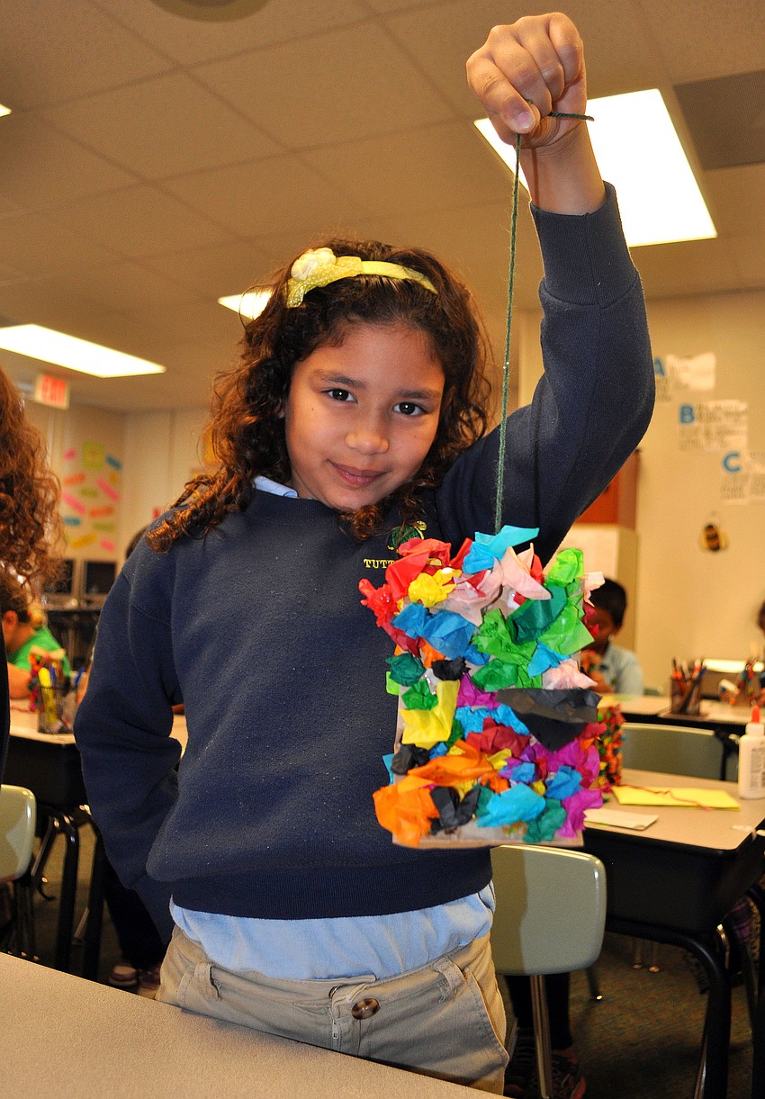 Manuela Gaviria-Soto with her piÃ±ata.