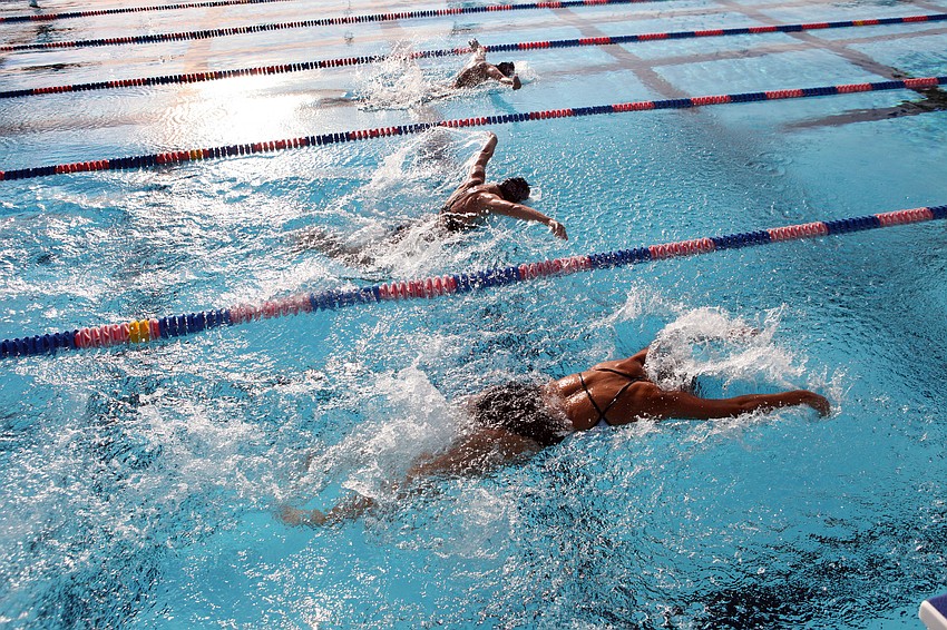 Competitors swim against one another in one of the 12 different events that made up the swim meet Wednesday, Sept. 12.